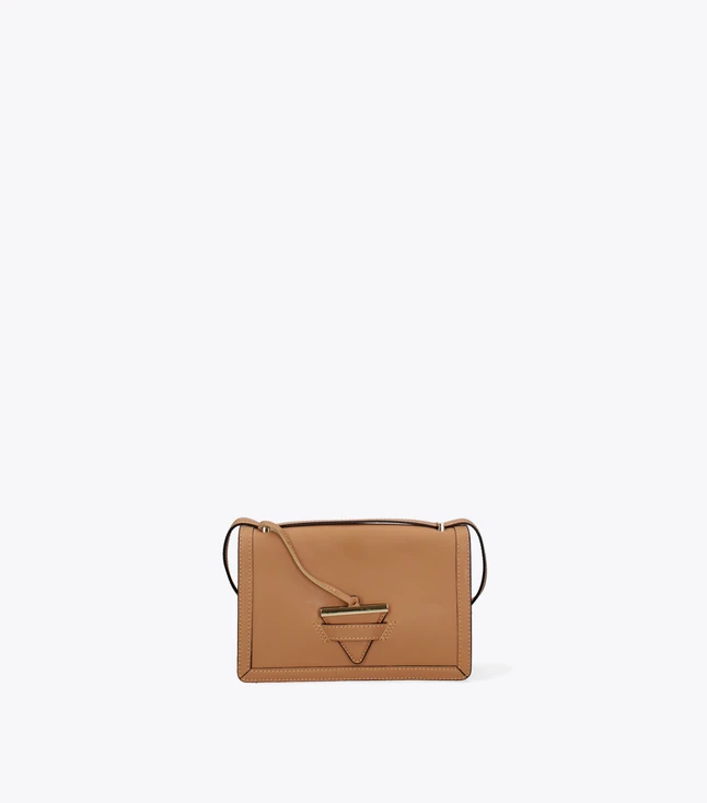 Vintage Fabric Crossbody Bag for Women with Fringe Detail and Bull Emblem for Casual Use
