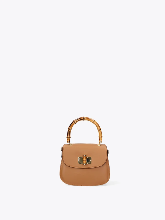 Sophisticated Leather Top Handle Bag with Unique Bamboo Clasp for Every Occasion.