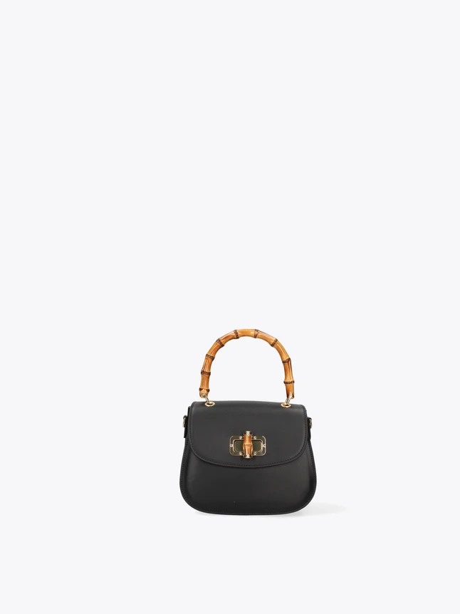 Sophisticated Leather Top Handle Bag with Unique Bamboo Clasp for Every Occasion.